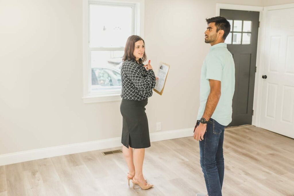 a real estate consultant introducing a home to a man