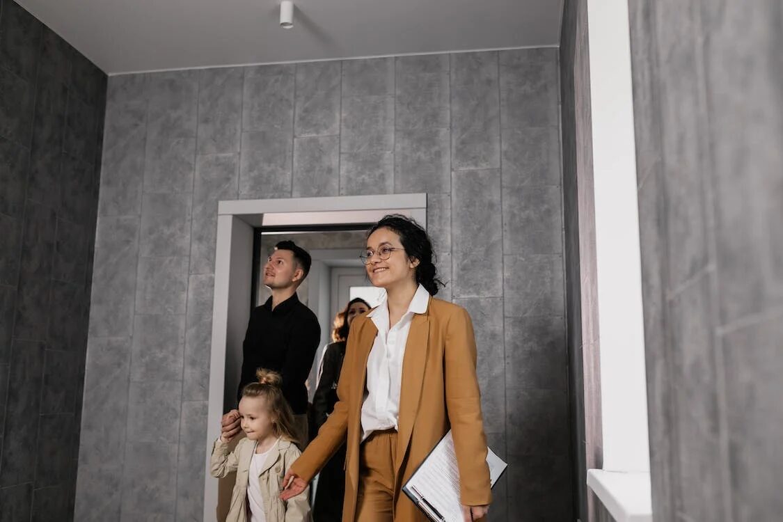 image of a family looking into a new home