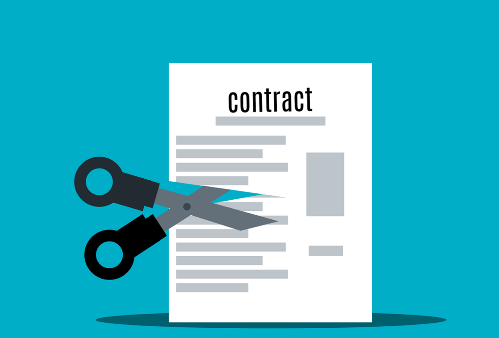 image of scissor cutting a contract